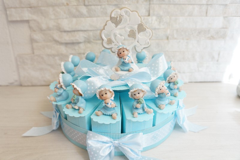 Regali e Bomboniere - Prodotti - Torta Bomboniera - BIMBO IN PIGIAMA AZZURRO 5CM RESINA ASSORTITO