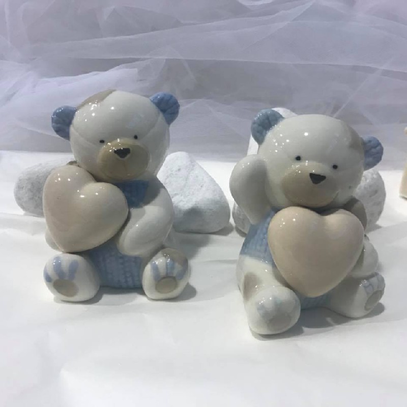 Regali e Bomboniere - Prodotti - OFFERTE DI GENNAIO - ORSETTO CELESTE  ASS. 6,5xh.9,5CM PORCELLANA 
