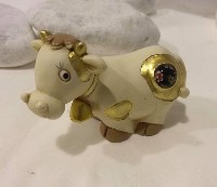 Regali e Bomboniere - Prodotti - OFFERTE DI GENNAIO - BOMBONIERA MUCCA FATTORIA 8 X 5.5 CM 