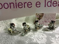 Regali e Bomboniere - Prodotti - Bomboniere Laurea - GUFO ARGENTO SU PIUMA 5X4CM